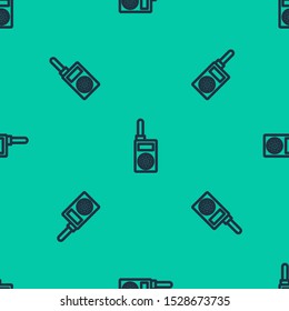 Blue line Walkie talkie icon isolated seamless pattern on green background. Portable radio transmitter icon. Radio transceiver sign.  Vector Illustration