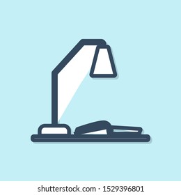 Blue line Workplace with table lamp and open book icon isolated on blue background. Table office lamp.  Vector Illustration