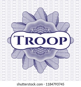 Blue linear rosette with text Troop inside