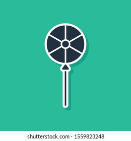 Blue Lollipop icon isolated on green background. Food, delicious symbol.  Vector Illustration