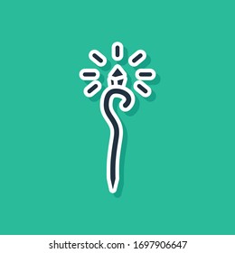 Blue Magic staff icon isolated on green background. Magic wand, scepter, stick, rod.  Vector Illustration