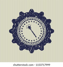 Blue magic stick icon inside rubber grunge texture stamp