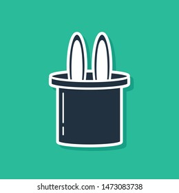 Blue Magician hat and rabbit ears icon isolated on green background. Magic trick. Mystery entertainment concept.  Vector Illustration