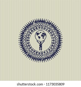 Blue man lifting world icon inside distressed grunge stamp