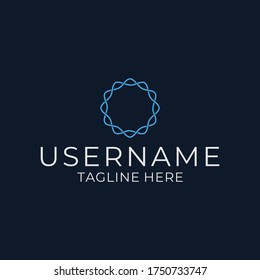 Blue mandala wave logo design on a dark background.