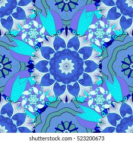 Blue mandalas. Winter snowflakes. Vector illustration. Frosty pattern.
