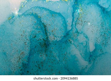 Blue marble texture with gold particles. Alcohol ink.  Abstract background. Painted by hand with alcohol ink. Banner, poster design. Vector.
