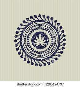 Blue marijuana leaf icon inside rubber grunge seal