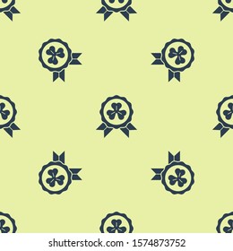 Blue Medal with four leaf clover icon isolated seamless pattern on yellow background. Happy Saint Patrick day.  Vector Illustration