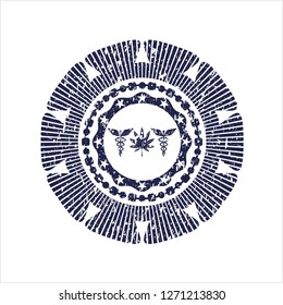 Blue medicinal weed icon inside distressed rubber grunge texture stamp