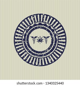 Blue medicinal weed icon inside distress rubber grunge texture stamp