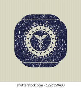 Blue medicine icon inside distress with rubber seal texture