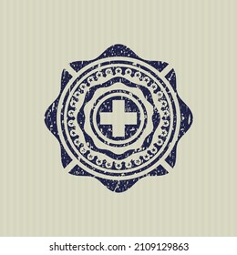 Blue medicine icon inside distressed rubber stamp. 