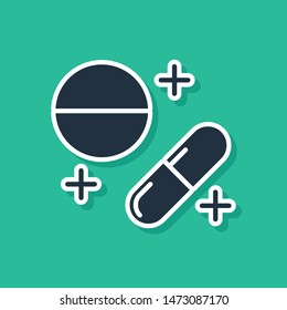 Blue Medicine pill or tablet icon isolated on green background. Capsule pill and drug sign. Pharmacy design.  Vector Illustration