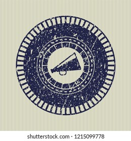 Blue megaphone icon inside distress rubber grunge stamp