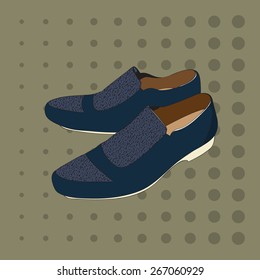 Blue men's shoes on a green background.
