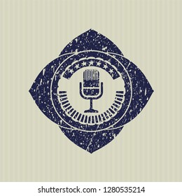 Blue microphone icon inside distress with rubber seal texture