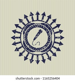 Blue microphone icon inside grunge style stamp