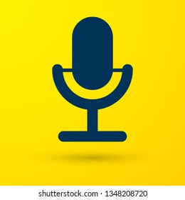 Blue Microphone icon isolated on yellow background. On air radio mic microphone. Speaker sign. Vector Illustration