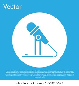 Blue Microphone icon isolated on blue background. On air radio mic microphone. Speaker sign. White circle button. Vector Illustration