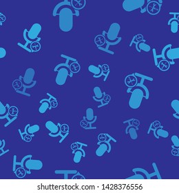 Blue Microphone with screwdriver and wrench icon isolated seamless pattern on blue background. Adjusting, service, setting, maintenance, repair, fixing.  Vector Illustration