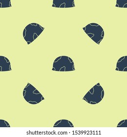 Blue Military helmet icon isolated seamless pattern on yellow background. Army hat symbol of defense and protect. Protective hat.  Vector Illustration