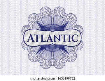 Blue money style emblem or rosette with text Atlantic inside