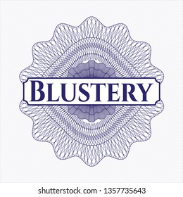 Blue money style rosette with text Blustery inside