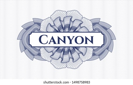 Blue money style rosette with text Canyon inside