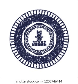 Blue motivational speech icon inside distressed rubber seal