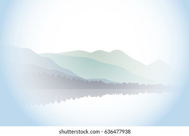 The blue mountain are covered with misty fog.