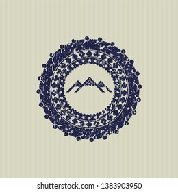 Blue mountain icon inside rubber texture