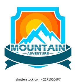 blue mountain logo on a shield background and wrapped in a ribbon