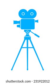 Blue movie camera on white background