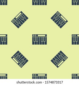 Blue Music synthesizer icon isolated seamless pattern on yellow background. Electronic piano.  Vector Illustration