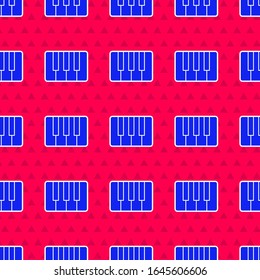 Blue Music synthesizer icon isolated seamless pattern on red background. Electronic piano.  Vector Illustration