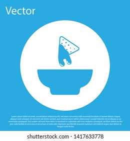 Blue Nachos in plate icon isolated on blue background. Tortilla chips or nachos tortillas. Traditional mexican fast food. White circle button. Vector Illustration