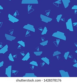Blue Nachos in plate icon isolated seamless pattern on blue background. Tortilla chips or nachos tortillas. Traditional mexican fast food. Vector Illustration
