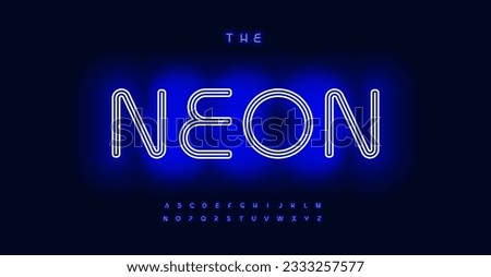Blue Neon alphabet, luminous vibrant typeface, nightlife electrifying glow. Font for club logos, casino signs, captivating headlines. Vector typeset. Foto d'archivio © 