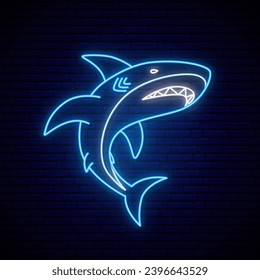 Blue neon glowing shark. Icon of predatory shark with an open mouth.