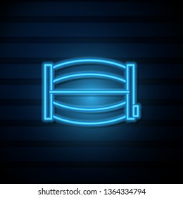Blue neon sign on dark wall Barrel of beer icon. Bar concept
