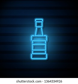 Blue neon sign on dark wall Whiskey bottle. Alcohol concept