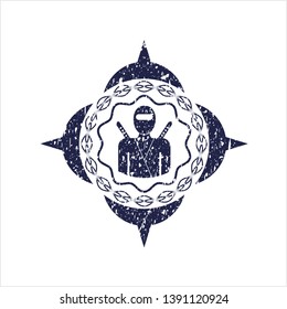Blue ninja icon inside distressed rubber stamp