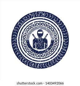 Blue ninja icon inside distressed rubber stamp with grunge texture