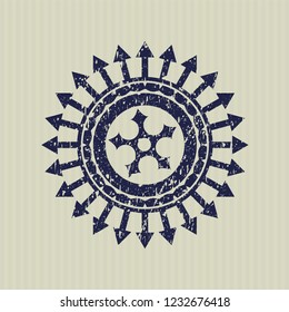 Blue ninja star icon inside rubber stamp