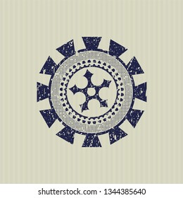 Blue ninja star icon inside rubber grunge texture seal
