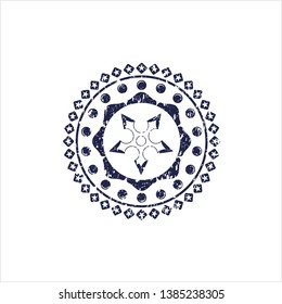Blue ninja star icon inside distress grunge stamp