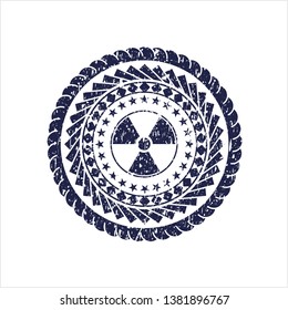 Blue nuclear, radioactive icon inside grunge seal