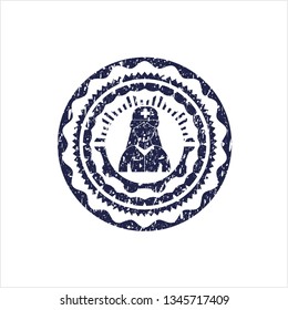Blue nurse icon inside rubber seal with grunge texture