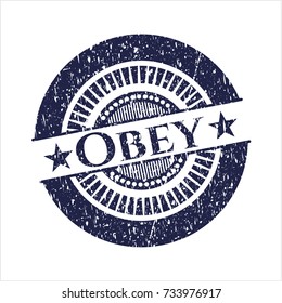 Blue Obey rubber seal with grunge texture